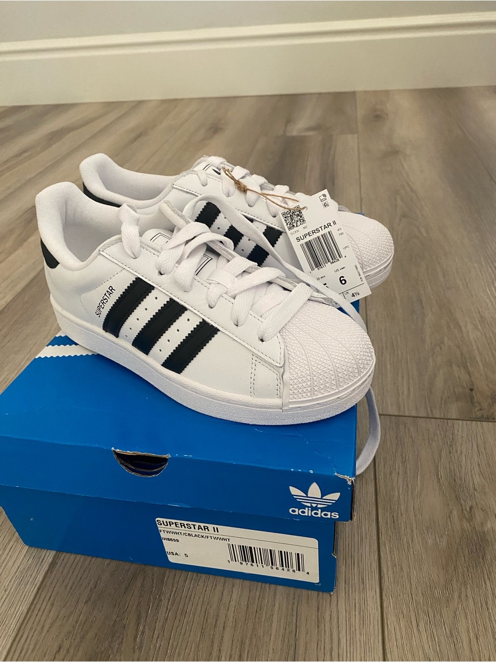 adidas White and Black Superstar Sneakers